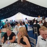 Dining under way in the splendid marquee Dining under way in the splendid marquee